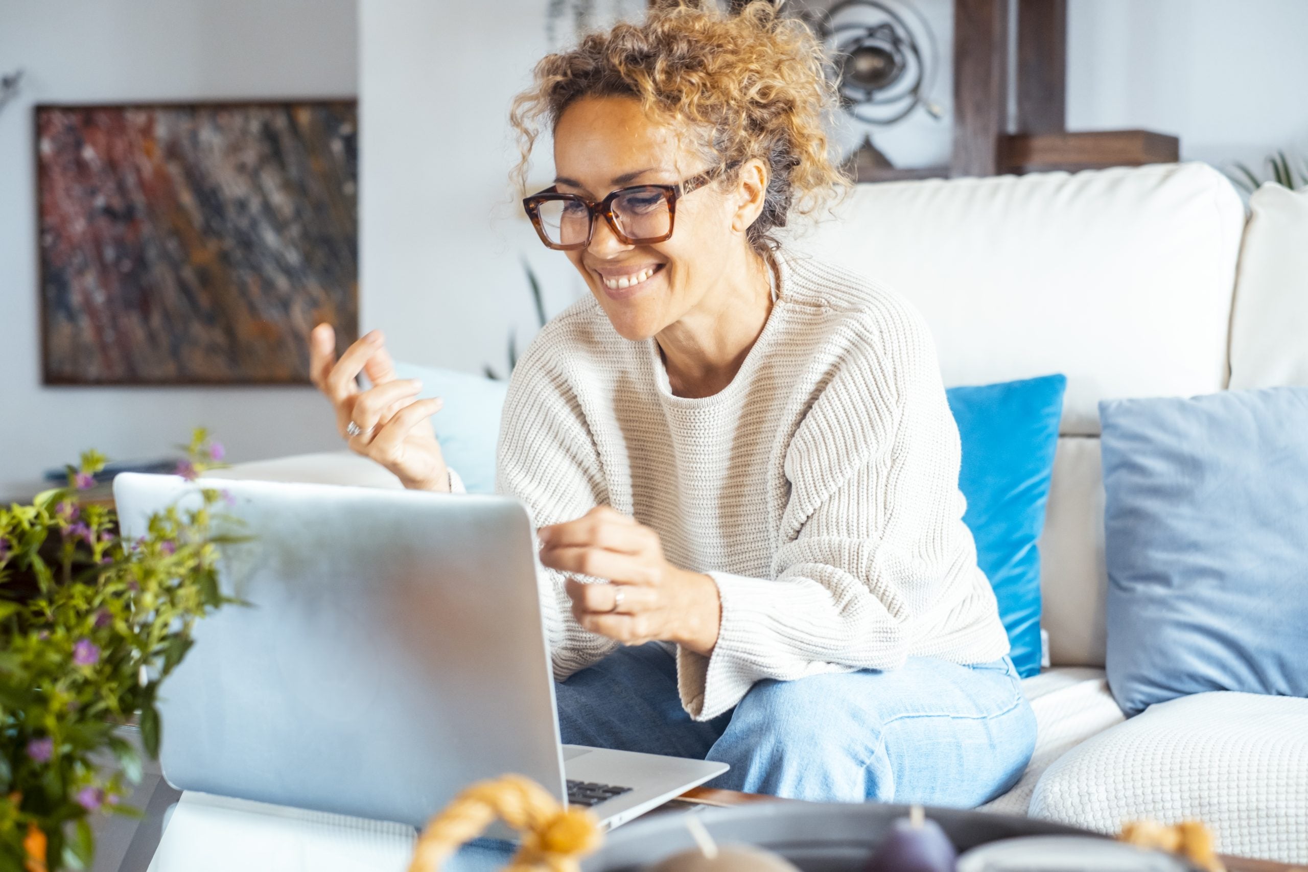 Woman comparing legitimate online loan options on a laptop